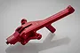 GPM Racing red anodized aluminium front chassis brace for RC vehicles, showing mounting points and laser-etched branding.