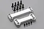 Two silver aluminium anti-roll bar covers with eight flat-head screws and four grub screws on a grey reflective surface.