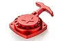 A red anodised aluminium pull start assembly for an RC engine, featuring a star design on the housing and a T-handle grip.