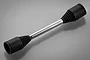 A silver metal RC driveshaft with black rubber protective boots on both ends, set against a neutral grey background.