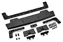 A Rovan black rear wing set for an RC Baja 5T, including the main wing, support brackets, mounting plates, and a collection of screws and nuts.