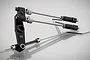 Rovan 5IVE-T 71cc throttle and brake linkage set featuring a black 17T servo arm, metal rods, springs, and connectors on a white background.