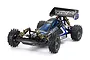 Tamiya Egress Black Edition 1/10 scale RC buggy kit, featuring a black body with blue accents, gold-colored shock absorbers, and off-road spike tires.