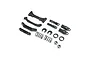 A set of black plastic RC car suspension parts including shock towers, shock bodies, springs, and clips on a white background.