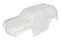A clear, unpainted polycarbonate body shell for the LaTrax Teton RC truck, shown from a high-angle side view against a white background.