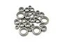 A collection of various sized metal ball bearings for RC cars arranged on a white background.