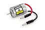 LaTrax 370 size brushed RC motor with a caution hot warning label and pre-soldered red and black wires with bullet connectors.
