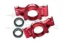 A pair of red anodized aluminium oversized rear hubs for RC cars by GPM Racing, shown with two metal ball bearings.
