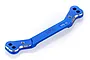 A blue anodized aluminium steering link for RC cars by GPM Racing, featuring machined edges and engraved text on a white background.