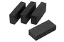 Four rectangular black foam blocks arranged on a white background.