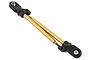 Two gold-coloured metal shock shafts with black plastic rod ends attached, isolated on a white background.