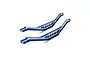 Two blue anodized aluminium lower chassis braces for Traxxas RC vehicles, shown from an angled perspective against a white background.