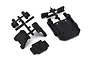 Black plastic RC car parts including a gearbox mount and servo mounting components on a white background.