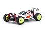 Kyosho Mini-Z Turbo Optima Mid Special RC buggy in white with neon yellow wheels and red shock absorbers.