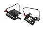 Traxxas RC light kit featuring front and rear bumpers with integrated LED lights and wiring harnesses.