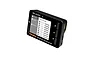 Futaba BR-4000 battery checker showing cell voltage readings on a digital screen.