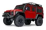 A red Traxxas TRX-4M Land Rover Defender RC rock crawler on a white background.