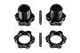 Two black aluminium wheel hex adapters, two serrated wheel nuts, and two drive pins arranged on a white background.