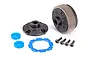 A Traxxas differential kit including a gear housing, differential cover, blue gaskets, and four black screws on a white background.