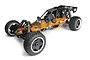 HPI Baja 5B 1/5 scale petrol RC buggy in orange and black with off-road tires and a roll cage, viewed from a high angle.