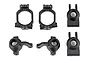 A set of six black plastic RC car suspension parts, including caster blocks and steering hubs, arranged on a white background.