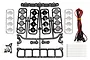 Team Associated XP LED Roof Light Kit parts on a white background, including plastic light housings, lenses, LED wiring, screws, and zip ties.