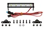 Team Associated 80mm LED light bar with mounting brackets, screws, and nuts on a white background.