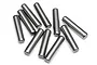 A collection of ten small, cylindrical metal drive pins scattered on a white background.