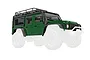 A green Traxxas 1/18 Land Rover Defender body shell with black roof rack and accessories, shown against a white background.