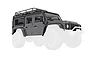 Silver Traxxas Land Rover Defender 1/18 scale RC body shell with roof rack and accessories shown against a white background.