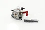 Rovan Walbro 1191 carburettor for RC engines, featuring a metal body, red choke lever, clear primer bulb, and a small plastic bag containing gaskets and hardware.