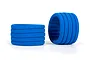 Two bright blue moulded foam tyre inserts for RC cars, shown against a plain white background.