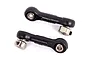 Two black plastic sway bar linkages with metal pivot balls and threaded collars for Traxxas RC vehicles.