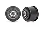 Two Traxxas 2.2/3.0 inch Weld satin black chrome rear drag racing rims shown from front and side angles.