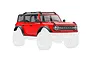 Red Traxxas 1/18 Ford Bronco body shell with black roof and trim, shown on a white background.