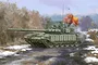An artistic illustration of a Russian T-72B3 tank with ERA and slat armor, featuring the number 224 on the turret, moving through a snowy, wooded landscape.