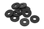 A pile of ten black circular foam body washers for RC cars on a white background.
