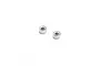Two small metal shielded ball bearings shown from an angled perspective against a white background.