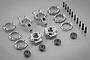 Rovan silver aluminium rear hub carriers and shim kit including various metal components, screws, and ball bearings arranged on a grey background.