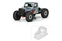 A composite image showing a painted, assembled RC crawler truck and an unpainted, clear Pro-Line Comp Wagon body shell.