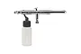 Iwata HP.BCR Revolution siphon-fed dual-action airbrush with a clear plastic paint bottle attached, shown against a white background.