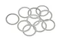 A cluster of ten thin, silver-coloured metal washers arranged on a plain white background.