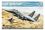 Box art for the Italeri 1/48 scale F-15E Strike Eagle plastic model kit, showing two fighter jets flying over a desert landscape.