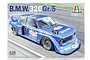 Box art for Italeri 1/24 scale BMW 320 Group 5 model kit, featuring a blue racing car with number 57 and Fruit of the Loom branding on a track.