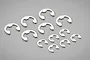 A collection of 12 silver-coloured metal E-clips of varying sizes arranged on a plain grey background.