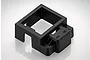 A black plastic RGT ESC mount with an integrated power switch housing, viewed from a high angle against a white background.