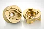 Two RGT copper wheel weights for RC cars, shown from the internal side against a white background.