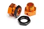 Two orange and black aluminium 17mm wheel hex adapters with matching black wheel nuts on a white background.