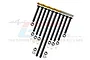 GPM Racing suspension pin set including black steel pins, metal nuts, washers, and a gold-coloured drill bit on a white background.