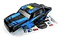 Black and blue painted RC truggy body shell for BlackZon Smyter with a matching sticker sheet on a white background.